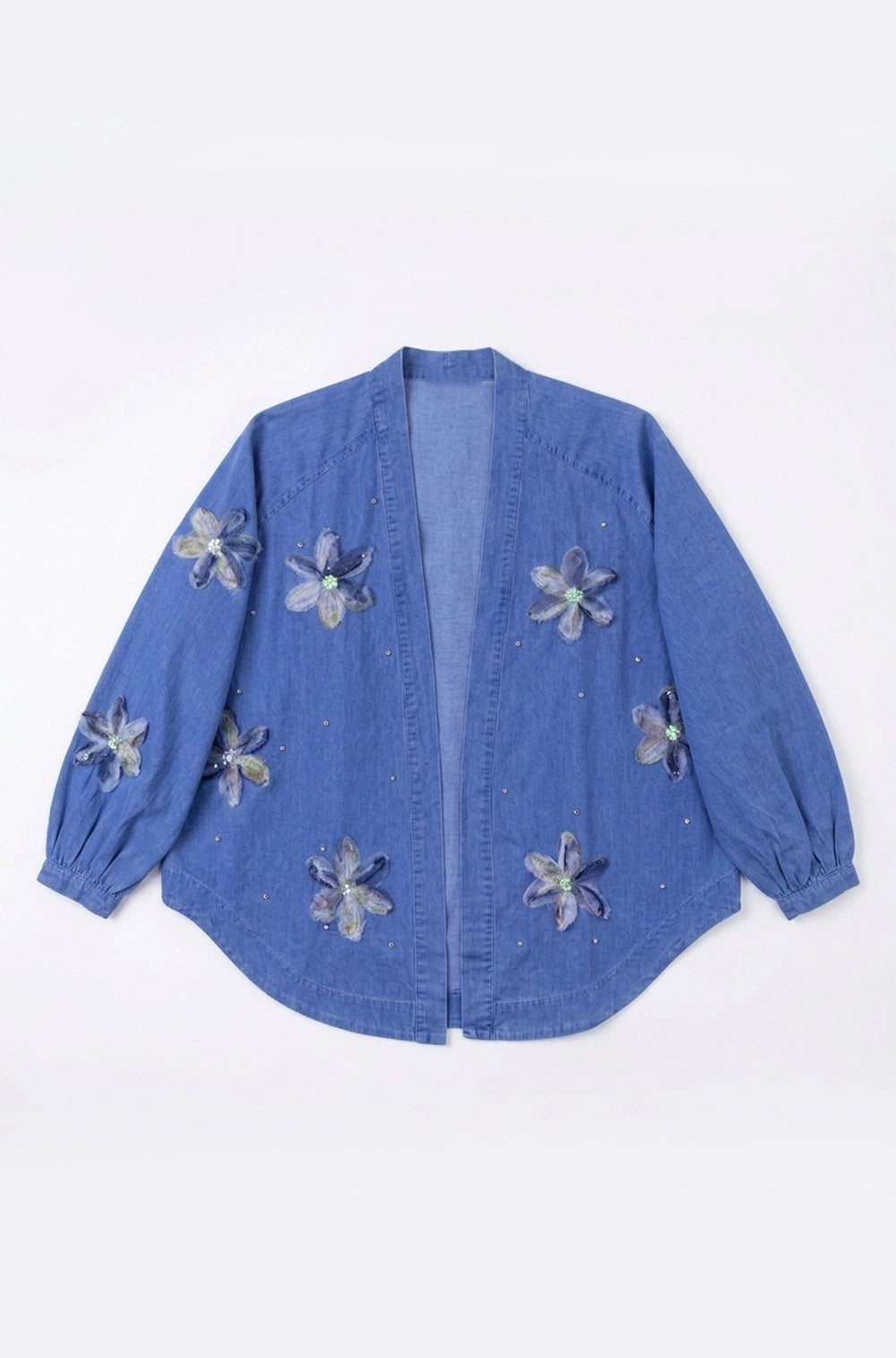 Blue denim jacket with floral embellishments on a white background